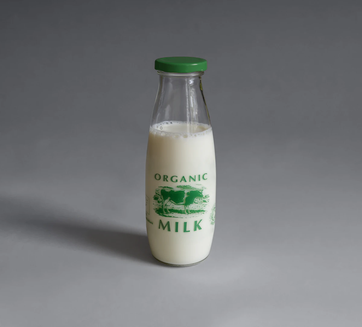 Fresh milk in a clear glass bottle